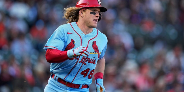 St. Louis Cardinals' Harrison Bader runs to first base after hitting a single against the San Francisco Giants during the sixth inning of a baseball game May 7, 2022, in San Francisco.