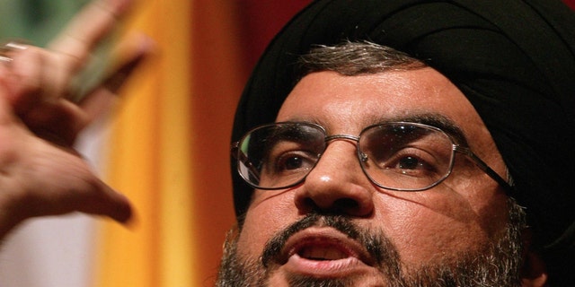 Sheikh Hassan Nasrallah, the head of the Lebanese Shiite Muslim movement Hezbollah, gives a speech to mark the anniversary of assassination by Israel of its secretary general Sheikh Abbas Musawi, 16 February 2006 in Beirut.