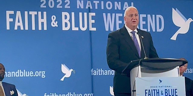 Patrick Yoes, National President of the Fraternal Order of Police, speaks to a crowd in Washington, D.C., on August 8, 2022