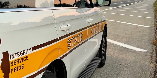 FILE- An Illinois State Police SUV is parked in a parking lot.