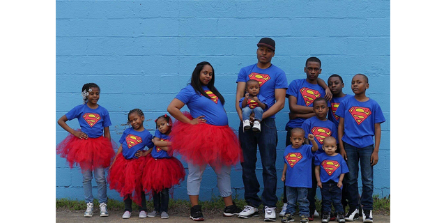 Pictured here are Iris and Cordell Purnell with their 10 children.  At the time, Iris was pregnant with her 11th child.  She gave birth in 2017.
