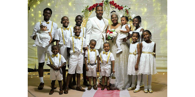 Cordell and Iris Purnell completed their family in 2019 with their 12th child. In this photo, the close-knit family is shown at the couple's vow renewal.