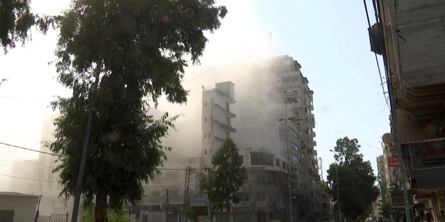 A building in Gaza City is hit, August 5, 2022.