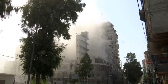 A building in Gaza City is struck, Aug. 5, 2022.