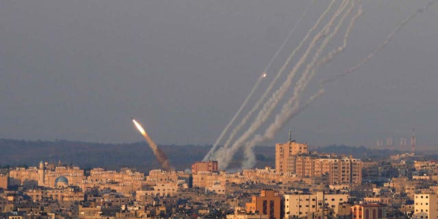 Rockets are launched from the Gaza Strip towards Israel, in Gaza City, Sunday, Aug. 7, 2022.