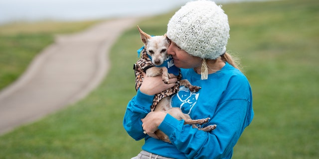 Ives and his adoptive mother Yves (pictured here) share a hug. Toddler Ives is still up for adoption and has lots of love to give.