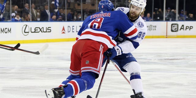 Jacob Trouba #8 of the New York Rangers skates against Brandon Hagel #38 of the Tampa Bay Lightning during the first period in Game Five of the Eastern Conference Final of the 2022 Stanley Cup Playoffs at Madison Square Garden on June 09, 2022 in New York City. 