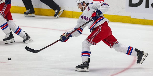 Jacob Trouba #8 of the New York Rangers puts a shot on net  during the first period in Game Three of the Eastern Conference Final of the 2022 Stanley Cup Playoffs at Amalie Arena on June 05, 2022 in Tampa, Florida. 