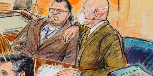 FILE: This artist sketch depicts Guy Wesley Reffitt, joined by his lawyer William Welch, right, in Federal Court, in Washington, on Feb. 28, 2022.