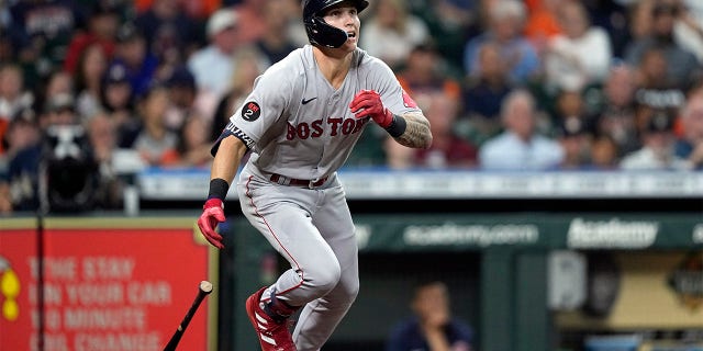 Boston Red Sox's Jarren Duran watches his RBI ground-rule double against the Houston Astros during the third inning of a baseball game Monday, Aug. 1, 2022, in Houston.