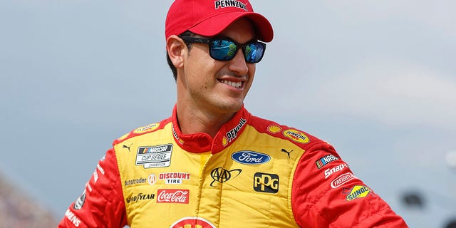 Joey Logano waits on the grid prior to the NASCAR Cup Series FireKeepers Casino 400 at Michigan International Speedway in Brooklyn, Michigan, on Aug. 7, 2022.