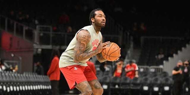 John Wall of the Houston Rockets warms up before the game against the Atlanta Hawks at State Farm Arena in Atlanta, Georgia, on Dec. 13, 2021.