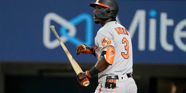 Baltimore Orioles' Jorge Mateo walks up the first base line wat ching the flight of his three-run home run ball in the third inning of a baseball game against the Texas Rangers, Tuesday, Aug. 2, 2022, in Arlington, Texas.