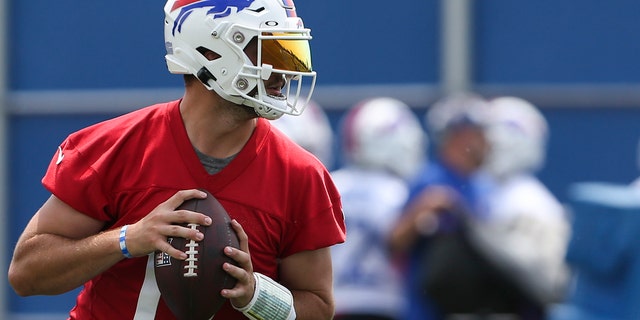 Josh Allen, #17 of the Buffalo Bills, drops back to pass during Bills mini camp on June 15, 2022 in Orchard Park, New York.