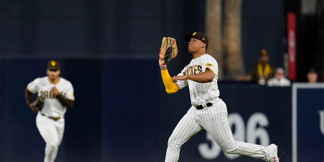 San Diego Padres right fielder Juan Soto makes the catch for the out on Colorado Rockies' Brendan Rodgers during the sixth inning of a baseball game Wednesday, Aug. 3, 2022, in San Diego.