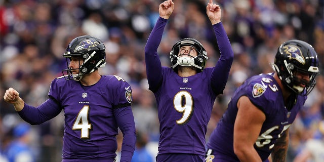 Ravens' Justin Tucker reacts after a successful field goal against the Los Angeles Rams on Jan. 2, 2022, ボルチモアで.