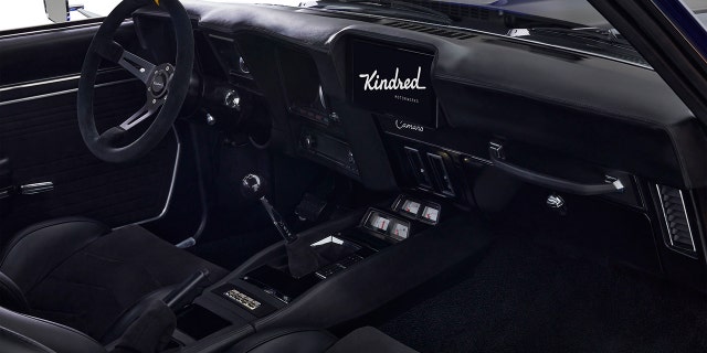 Kindred updates the original interiors with a modern touchscreen infotainment system.