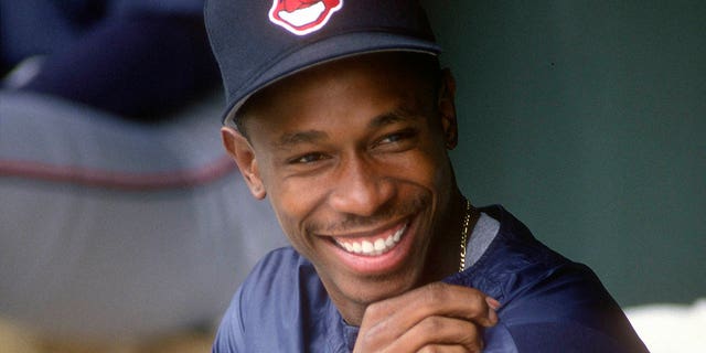 Kenny Lofton of the Cleveland Indians looks on from the dugout circa 1994 at Oriole Park at Camden Yards in Baltimore, Maryland.