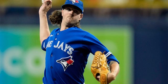 Toronto Blue Jays starting pitcher Kevin Gausman delivers to the Tampa Bay Rays during the first inning of a baseball game Tuesday, Aug. 2, 2022, in St. Petersburg, Fla.