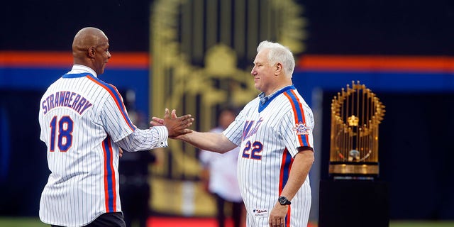 Former teammates Ray Knight (22) and Darryl Strawberry (18) greet one another during the 1986 New York Mets 30th anniversary reunion celebration at Citi Field in New York City on May 28, 2016.