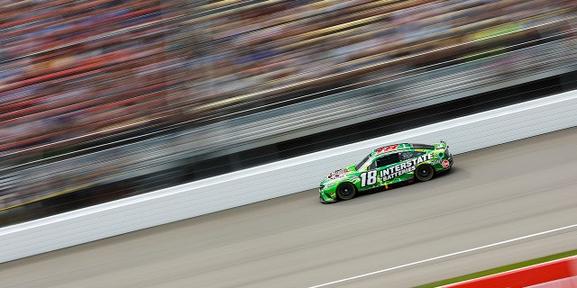 Kyle Busch, driver of the #18 Interstate Batteries Toyota, drives during the NASCAR Cup Series FireKeepers Casino 400 at Michigan International Speedway, Aug. 7, 2022, in Brooklyn, Michigan.