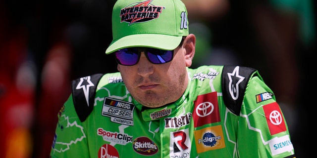 Kyle Busch watches during NASCAR Cup Series auto race qualifying at the Michigan International Speedway in Brooklyn, Michigan, Saturday, Aug. 6, 2022.