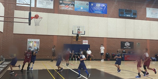 Children in the Los Angeles Youth Basketball League are still required to wear masks due to COVID-19.