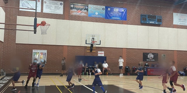 Kids in a youth basketball league in Los Angeles are still being required to wear masks due to COVID-19.