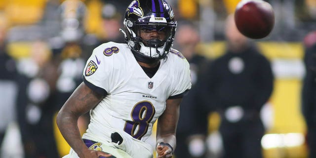 Lamar Jackson of the Baltimore Ravens throws a ball at Heinz Field in Pittsburgh on December 5, 2021.