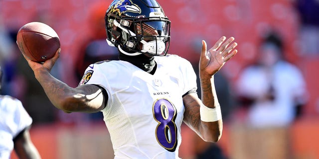 Lamar Jackson, #8 of the Baltimore Ravens, throws the ball during warm-up before the game against the Cleveland Browns at FirstEnergy Stadium on December 12, 2021 in Cleveland.