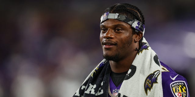 Lamar Jackson, #8 of the Baltimore Ravens, looks on against the Tennessee Titans during the second half at M&amp;T Bank Stadium on August 11, 2022 in Baltimore.
