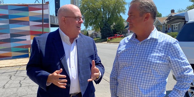 Republican Gov. Larry Hogan of Maryland with Republican Rep. Don Bacon of Nebraska on August 10, 2022 in Omaha, Nebraska 