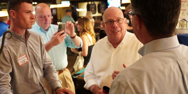 Maryland Gov. Larry Hogan meets with New Hampshire Home Builders Association during a trip to New Hampshire, on July 12, 2022 in Portsmouth, N.H.