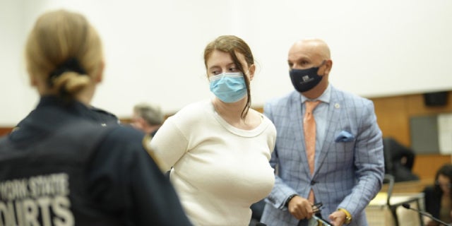 handcuffed Lauren Pazienza in court