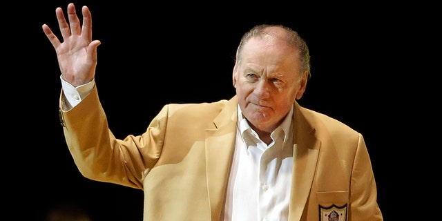 Len Dawson is introduced before the inaugural Pro Football Hall of Fame Fan Fest Friday, May 2, 2014, at the International Exposition Center in Cleveland. 