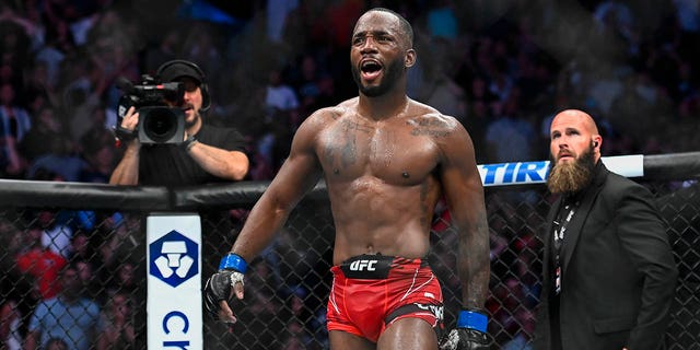 Leon Edwards celebrates after winning a welterweight title bout against Kamaru Usman at Vivint Arena on Aug. 20, 2022, in Salt Lake City, Utah.