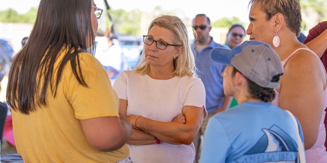 Rep. Liz Cheney speaks with voters on the Wind River Reservation in Wyoming, July 16, 2022