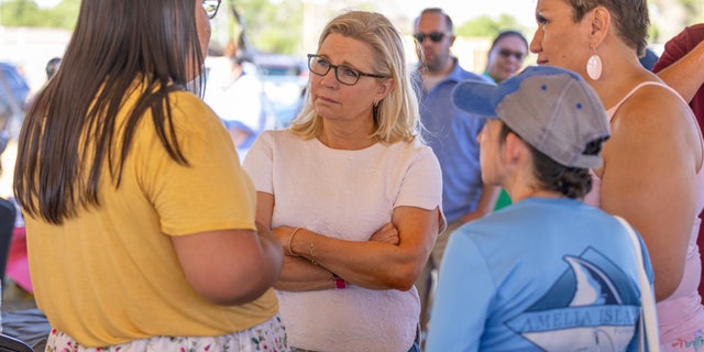 Rep. Liz Cheney talks with voters at Wyoming's Wind River Reservation, on July 16, 2022.