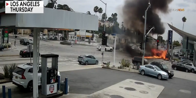 The fiery aftermath of the collision at the busy intersection of South La Brea Avenue and Slauson Avenue in the Windsor Hills area of West Los Angeles.