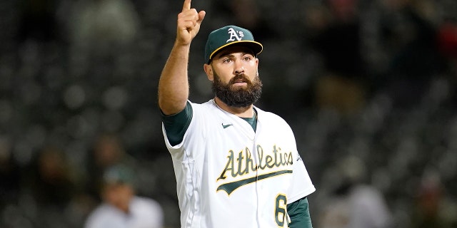 Oakland Athletics pitcher Lou Trivino celebrates after the A's defeated the Houston Astros in Oakland, Calif., on July 26, 2022.