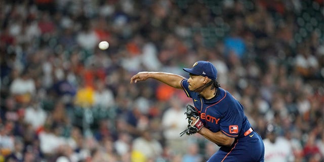 Houston Astros starting pitcher Luis Garcia throws against the Boston Red Sox during the first inning of a baseball game Monday, Aug. 1, 2022, in Houston.