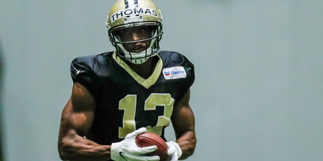 New Orleans Saints wide receiver Michael Thomas works on passing drills during training camp Aug. 3, 2019 at the Ochsner Sports Performance Center in Metairie, La.