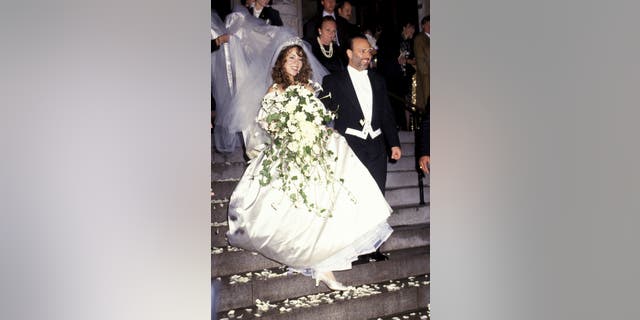 Mariah Carey and Tommy Mottola at St Thomas Episcopal Church/Metropolitan Club in New York City at their wedding in 1993.