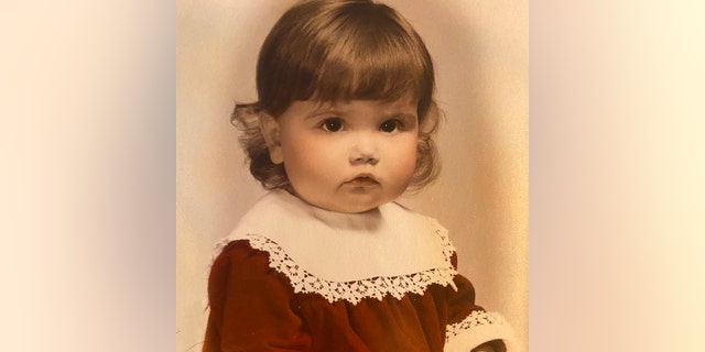 Mary McLaughlin was raised by her mother for about five months before neighbors became McLaughlin's guardians. She grew up in Michigan — and continued to have a relationship with her birth mother.