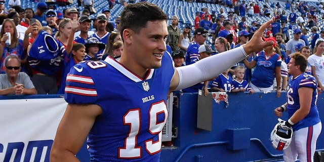 Buffalo Bills punter Matt Araiza waves to fans after a preseason game against the Indianapolis Colts in Orchard Park, New York, on Aug. 13, 2022.