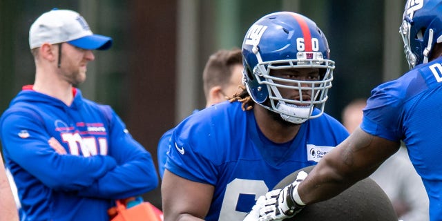 New York Giants offensive lineman Marcus McKethan (60) practices a drill during rookie camp at Quest Diagnostics Training Center.