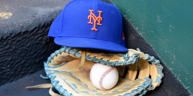 A New York Mets baseball cap on the stairs of the dugout before the game against the Washington Nationals at Nationals Park, May 10, 2022, in Washington, D.C.