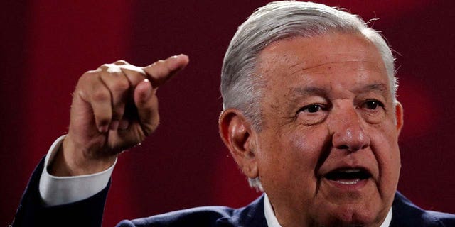 Mexican President Andres Manuel Lopez Obrador gestures during a press conference at the National Palace in Mexico City, June 20, 2022.
