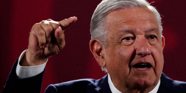 Mexican President Andres Manuel Lopez Obrador gestures during a press conference at the National Palace in Mexico City, June 20, 2022.