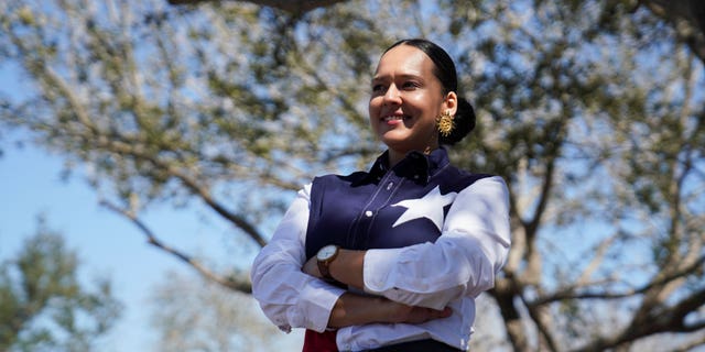 Michelle Vallejo, a progressive democratic candidate for District 15 who was recently endorsed by Elizabeth Warren, poses for a photo at a voting site in McAllen, Texas, March 1, 2022.